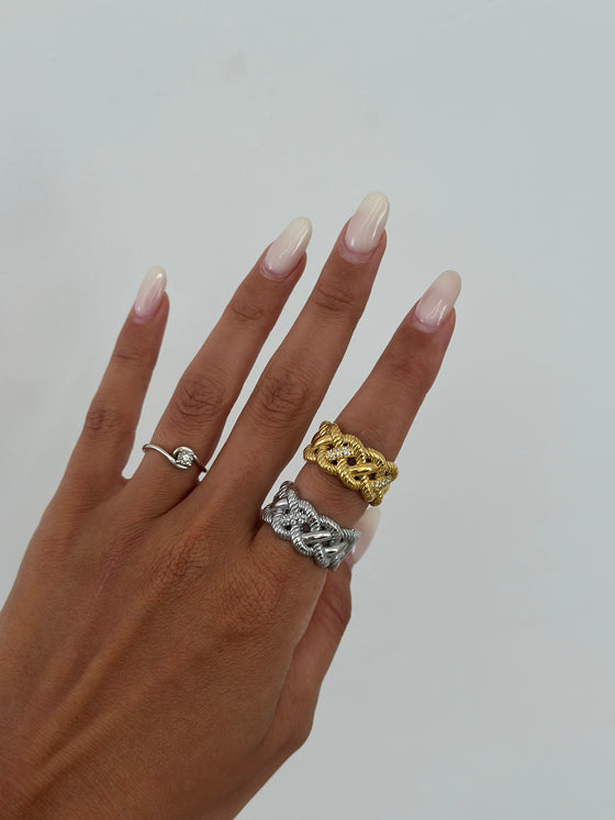 Anello intreccio e zirconi