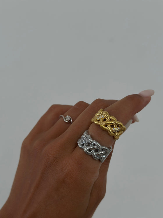 Anello intreccio e zirconi