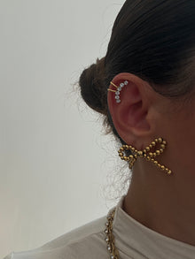  Orecchini fiocco oro - aria accessorize